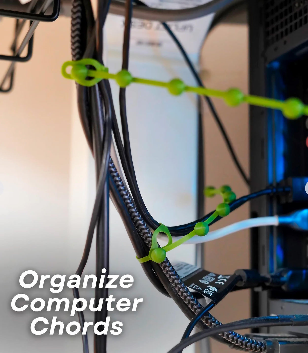 String of Pearls cable organizer in use, neatly tying computer chords for a tidy workspace.