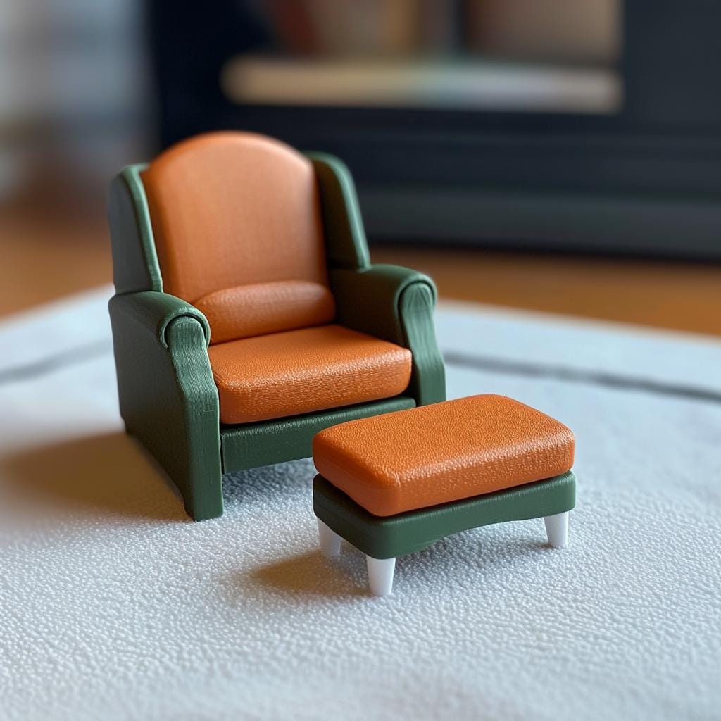 1:12 scale modern dollhouse armchair with ottoman in green and orange, perfect for miniature living room decor.