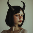 Model wearing 3D printed subtle demon horns, showcasing a gothic fantasy look with elegant curves.