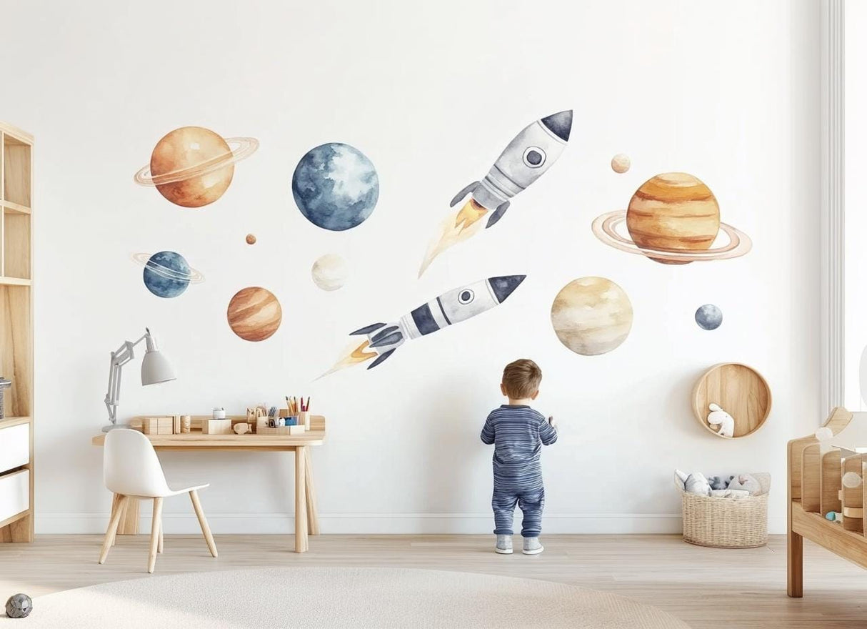Kid admiring colorful watercolor rocket and planet wall decals in a bright nursery with a playful space theme.