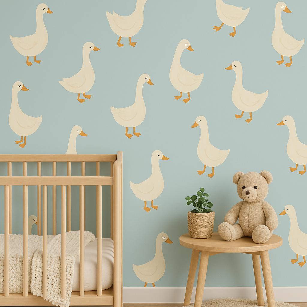 Removable goose wall decals in a nursery with light blue walls and a wooden crib, perfect for baby room decor.