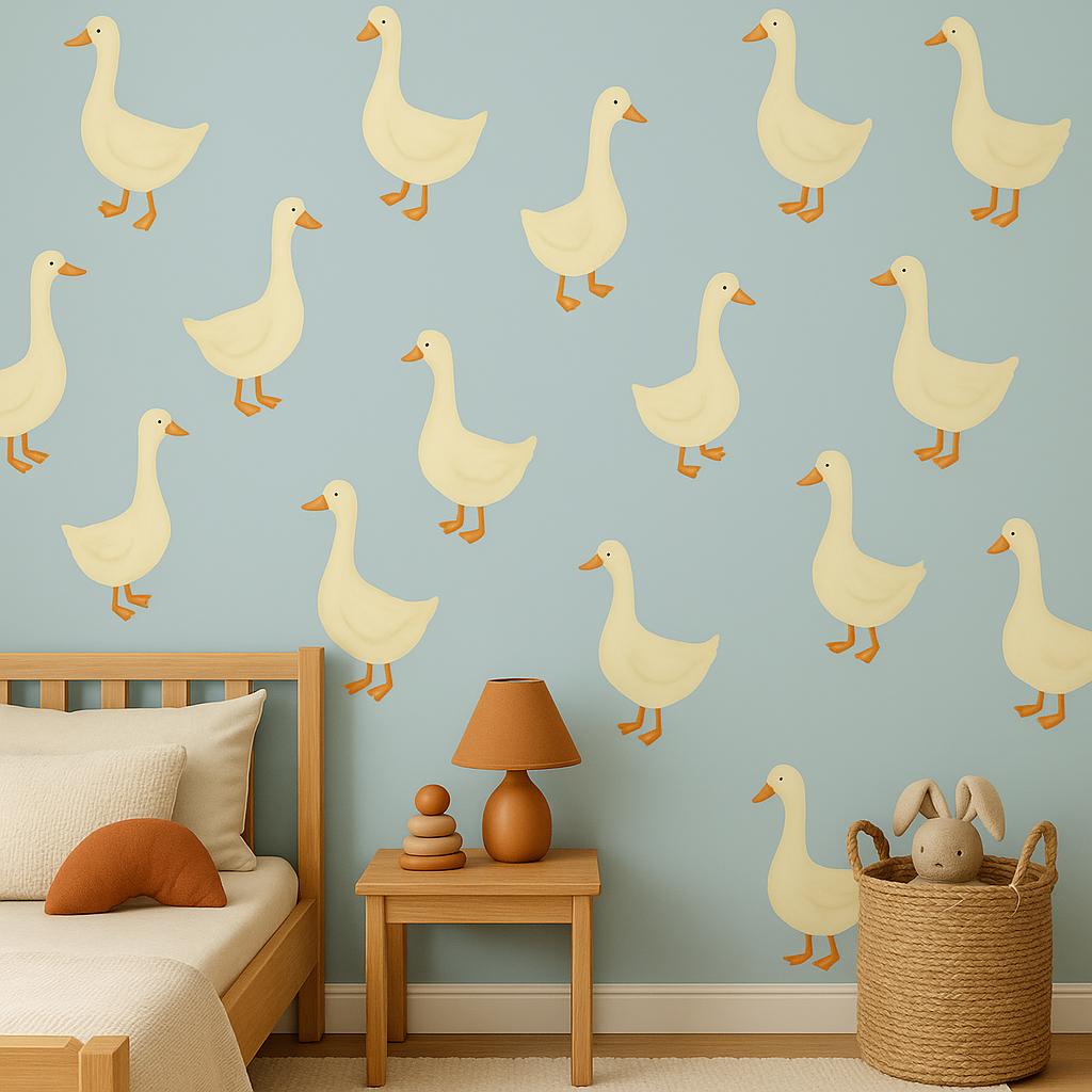 Whimsical yellow goose wall decals in a boho nursery, enhancing playful baby room decor.