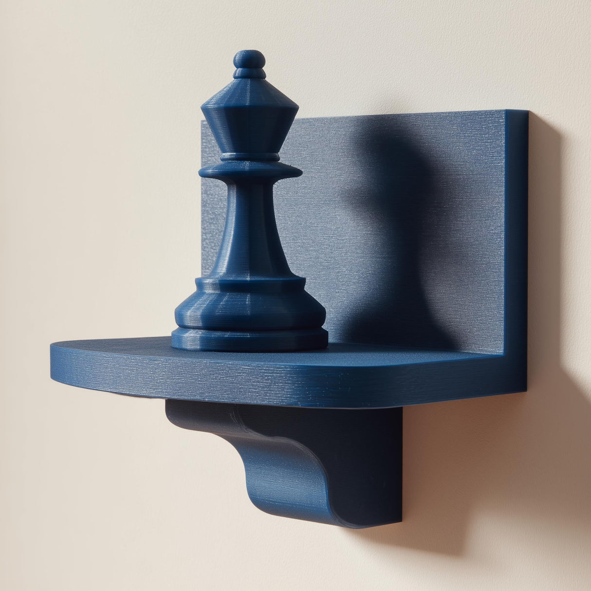 3D printed wall-mounted shelf featuring a chess queen piece standing on a compact floating ledge, designed as minimalist strategy-inspired wall decor.