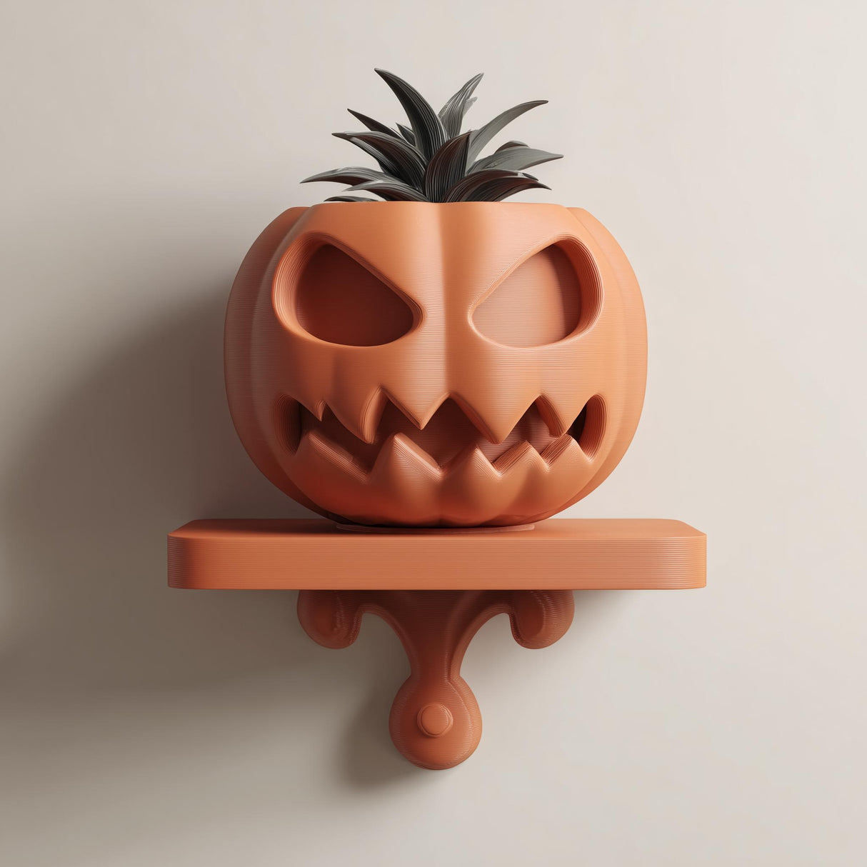 3D printed wall-mounted pumpkin face planter shelf with integrated pot and small plant, displayed on a neutral wall in soft natural light.