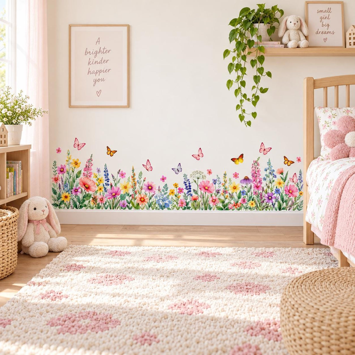 Nursery wall sticker depicting a meadow border with delicate butterflies, colorful blooms and leafy greenery.