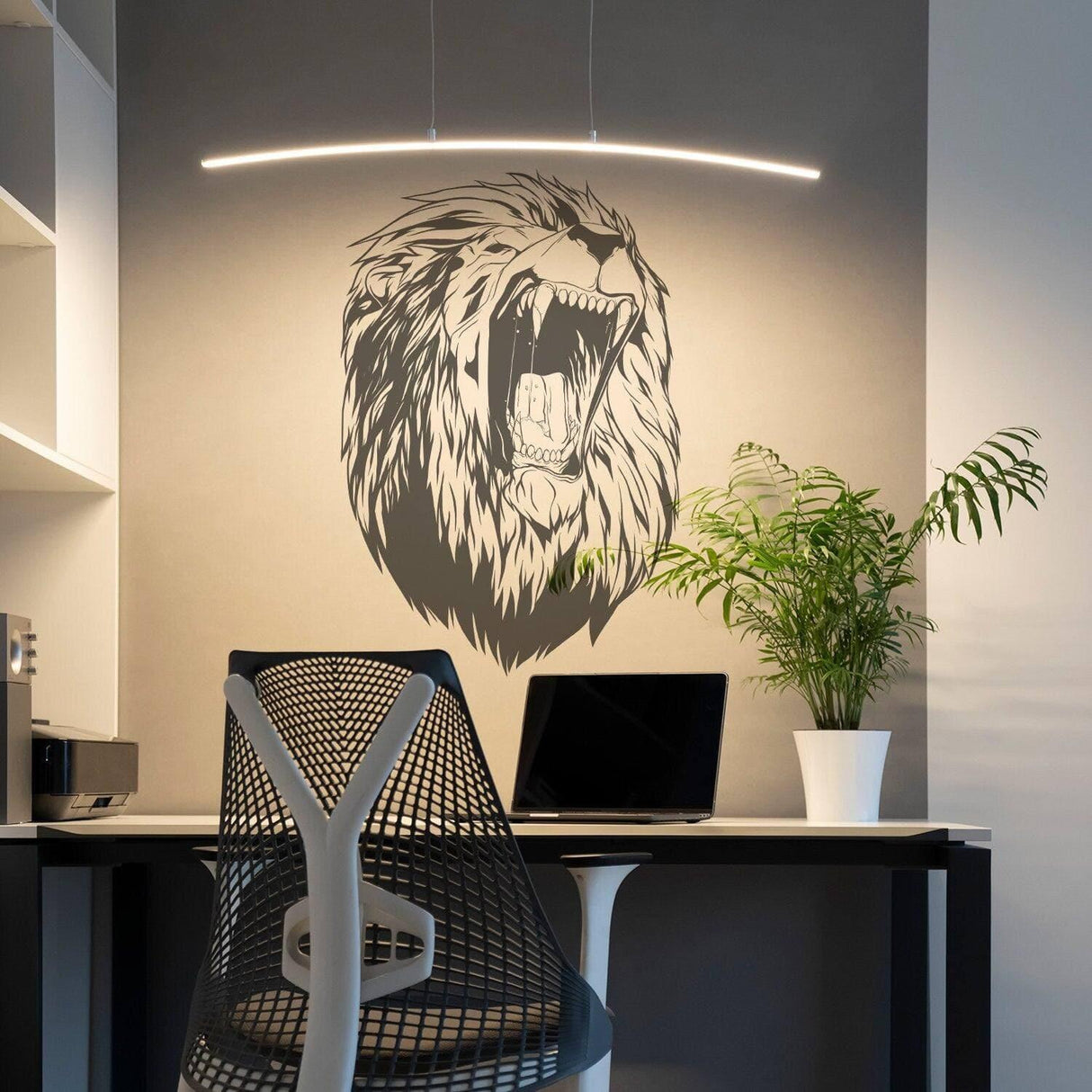 Lion King wall vinyl sticker in a modern workspace, showcasing a roaring lion head with decor elements.