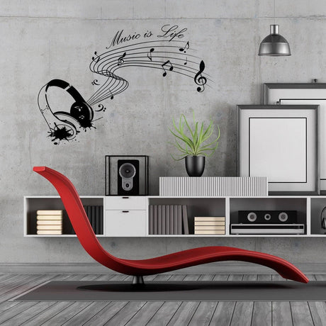 Wall sticker featuring musical notes and headphones with the text 'Music is Life' on a modern interior wall.