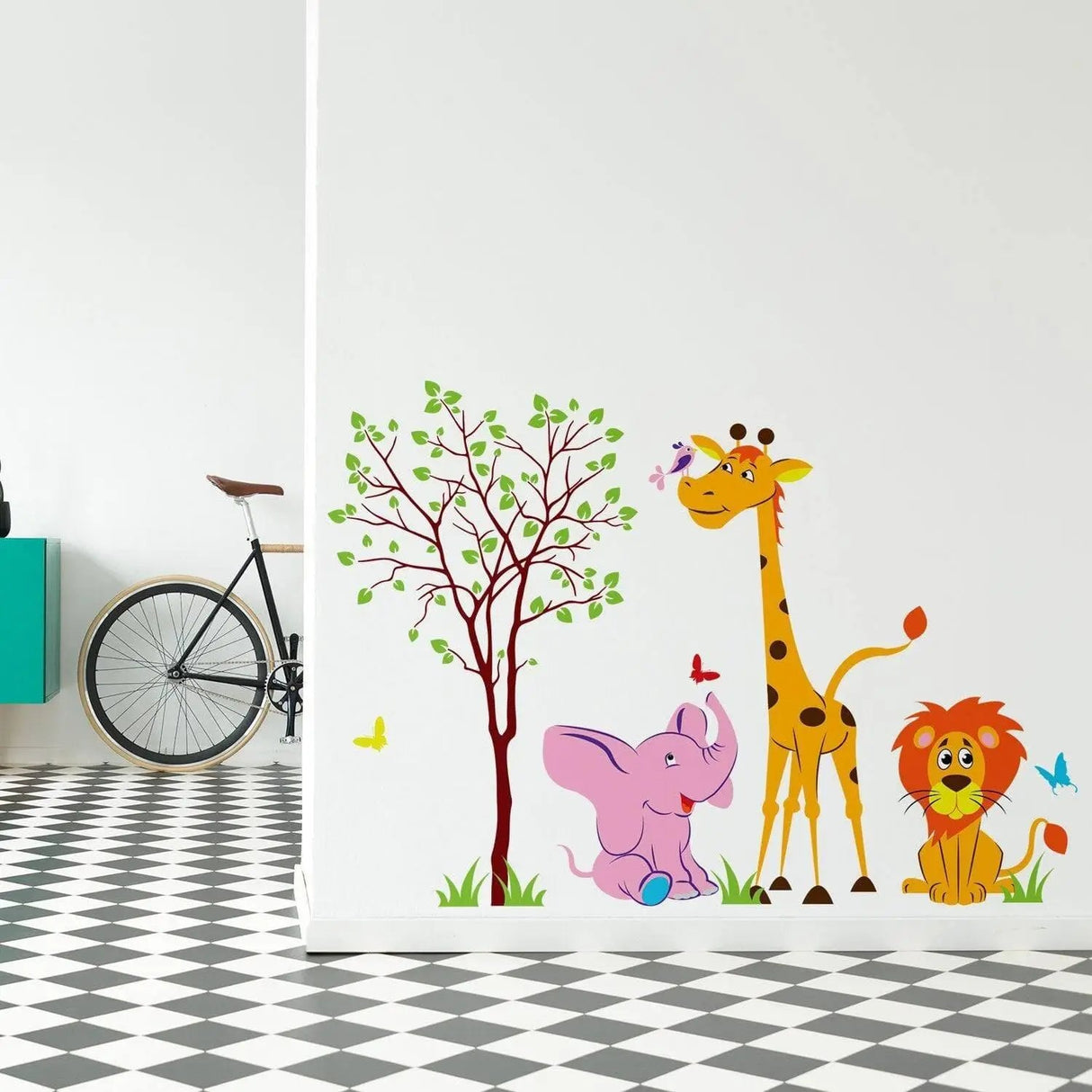 Colorful safari animal wall decal featuring a giraffe, elephant, and lion near a tree, ideal for nursery decor.