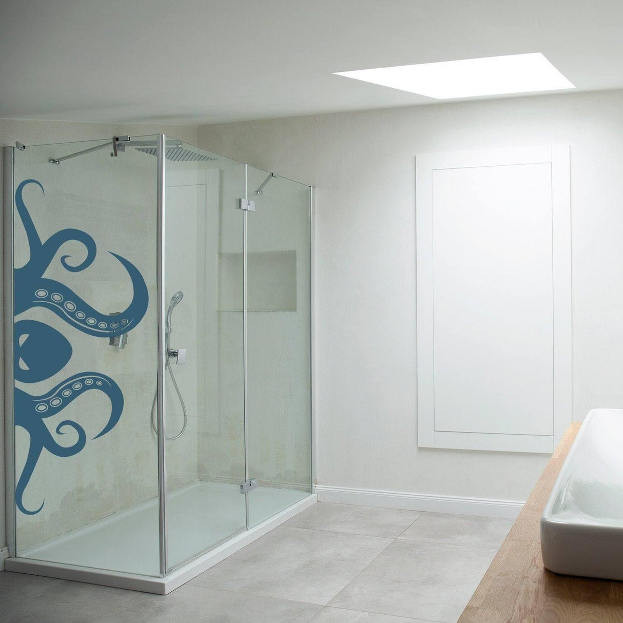 Octopus tentacle wall decal in modern bathroom, creating an oceanic theme with a stylish design.
