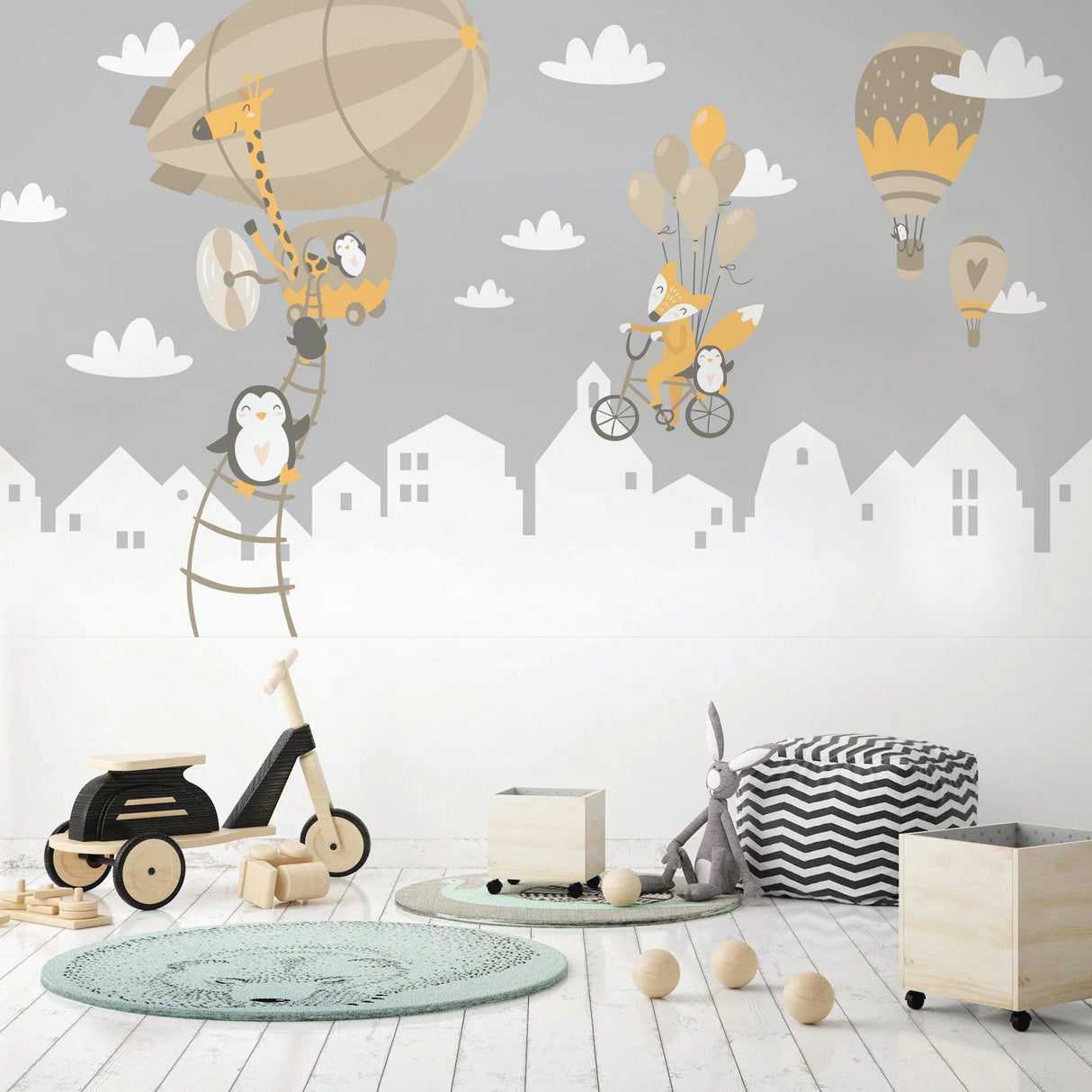 WhimsyLand wall decals featuring penguins, foxes, and hot air balloons in a playful nursery setting.