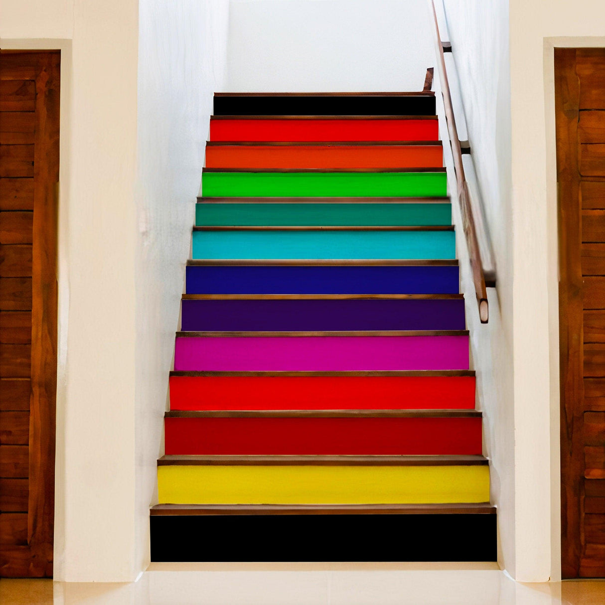 Colorful stair risers featuring rainbow decals for a vibrant home transformation.