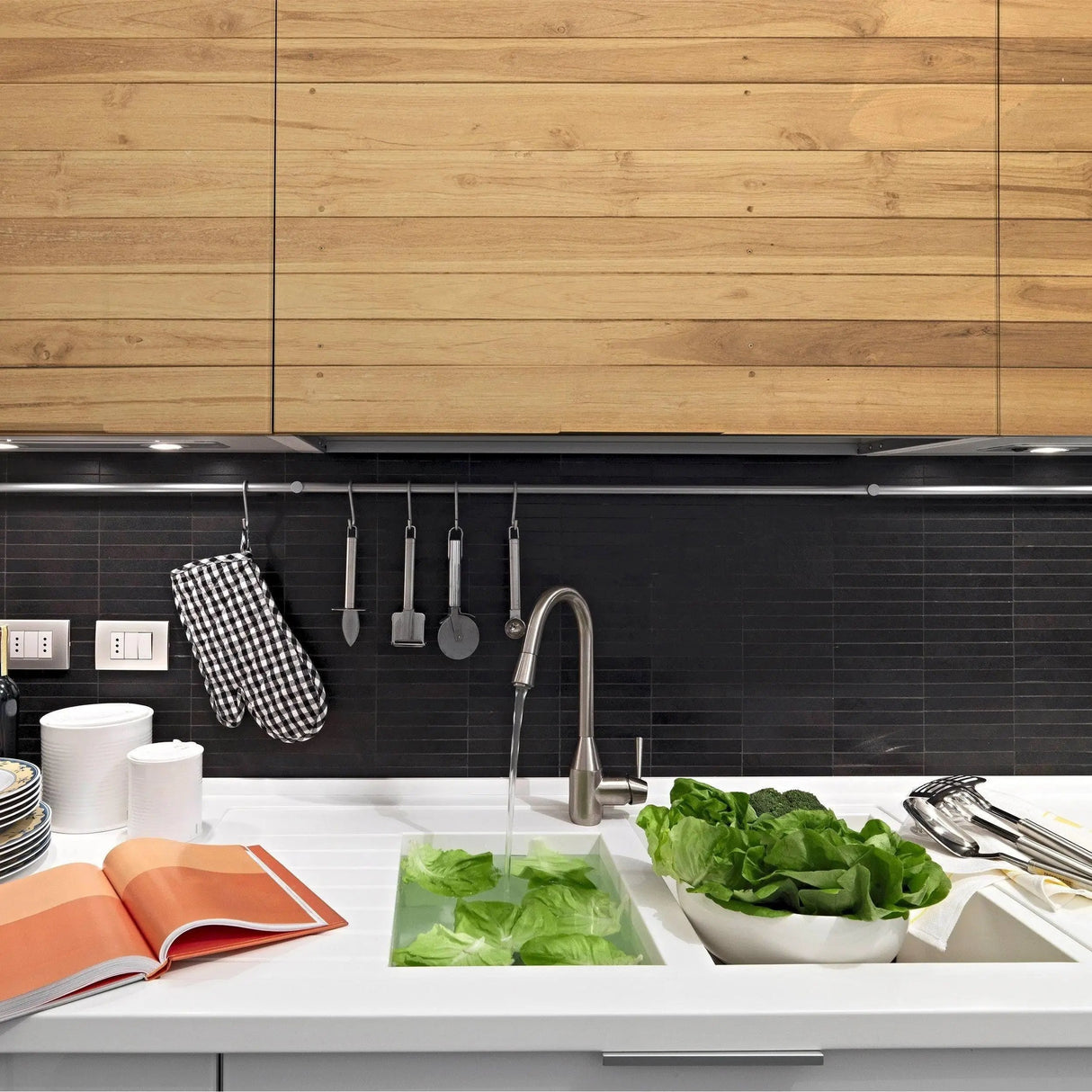 Stylish kitchen featuring adhesive rustic wood wallpaper, modern sink, and fresh vegetables on countertop.