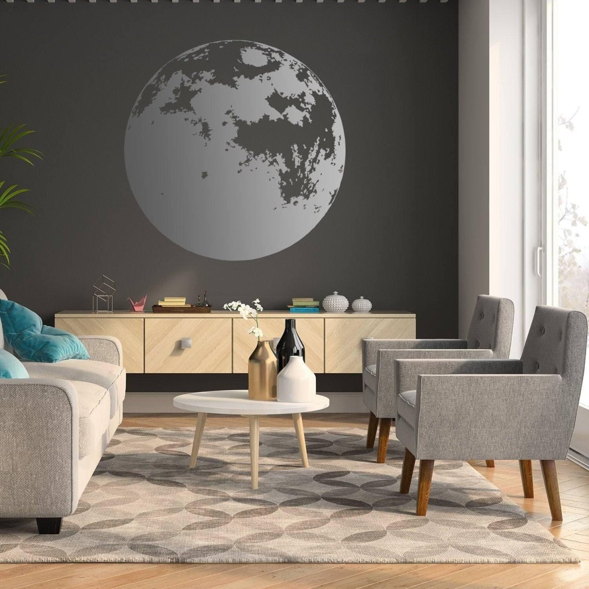 Stylish living room featuring a large moon wall sticker on a dark wall, with modern furniture and decor.