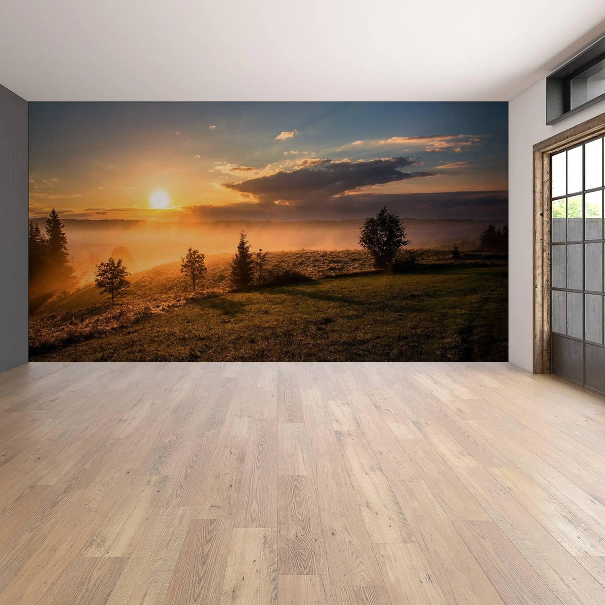 Scenic sunset wall mural featuring trees and hills, creating a serene atmosphere for home dΓ©cor.
