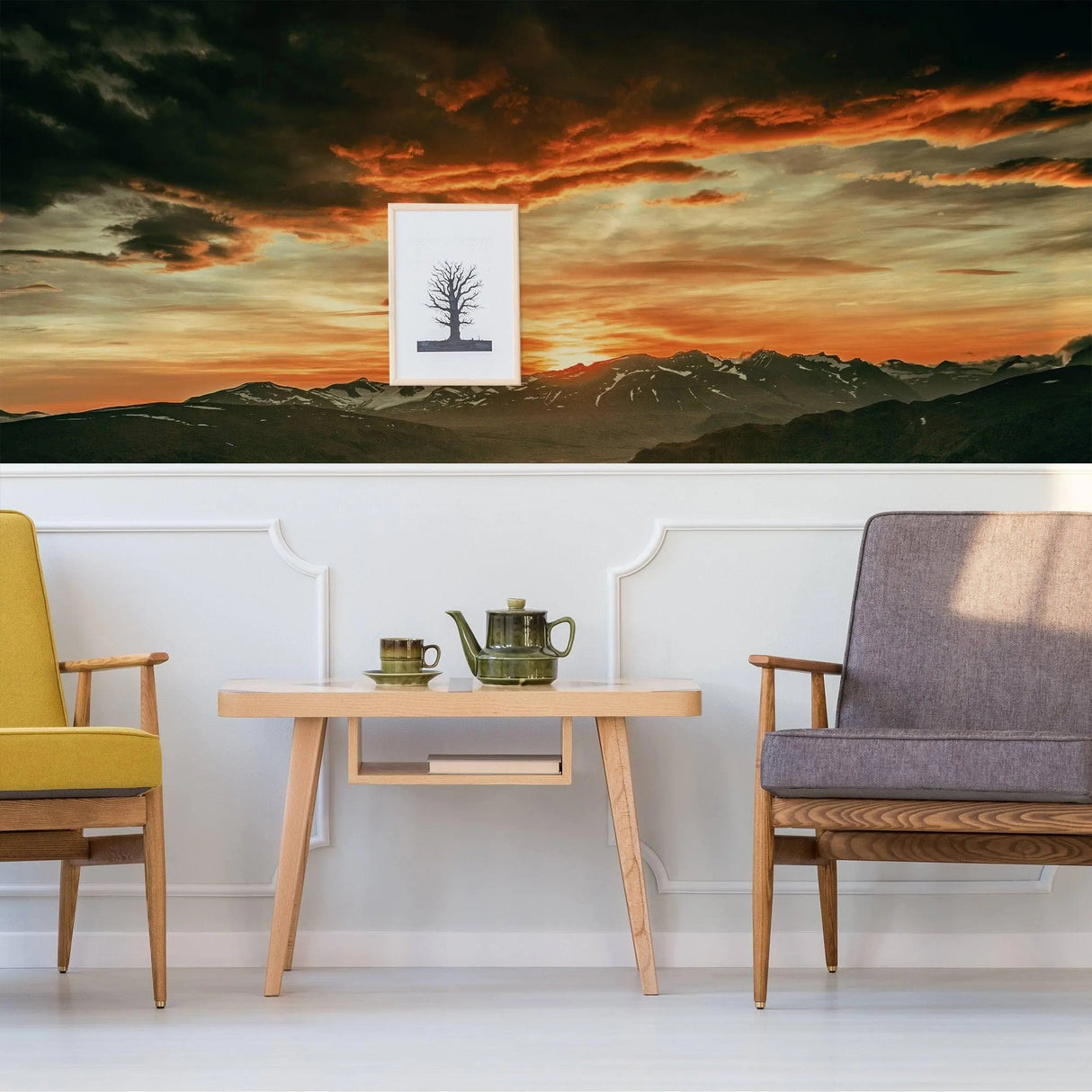 Elegant living room featuring Nature's Symphony sunset wall stickers above modern furniture.