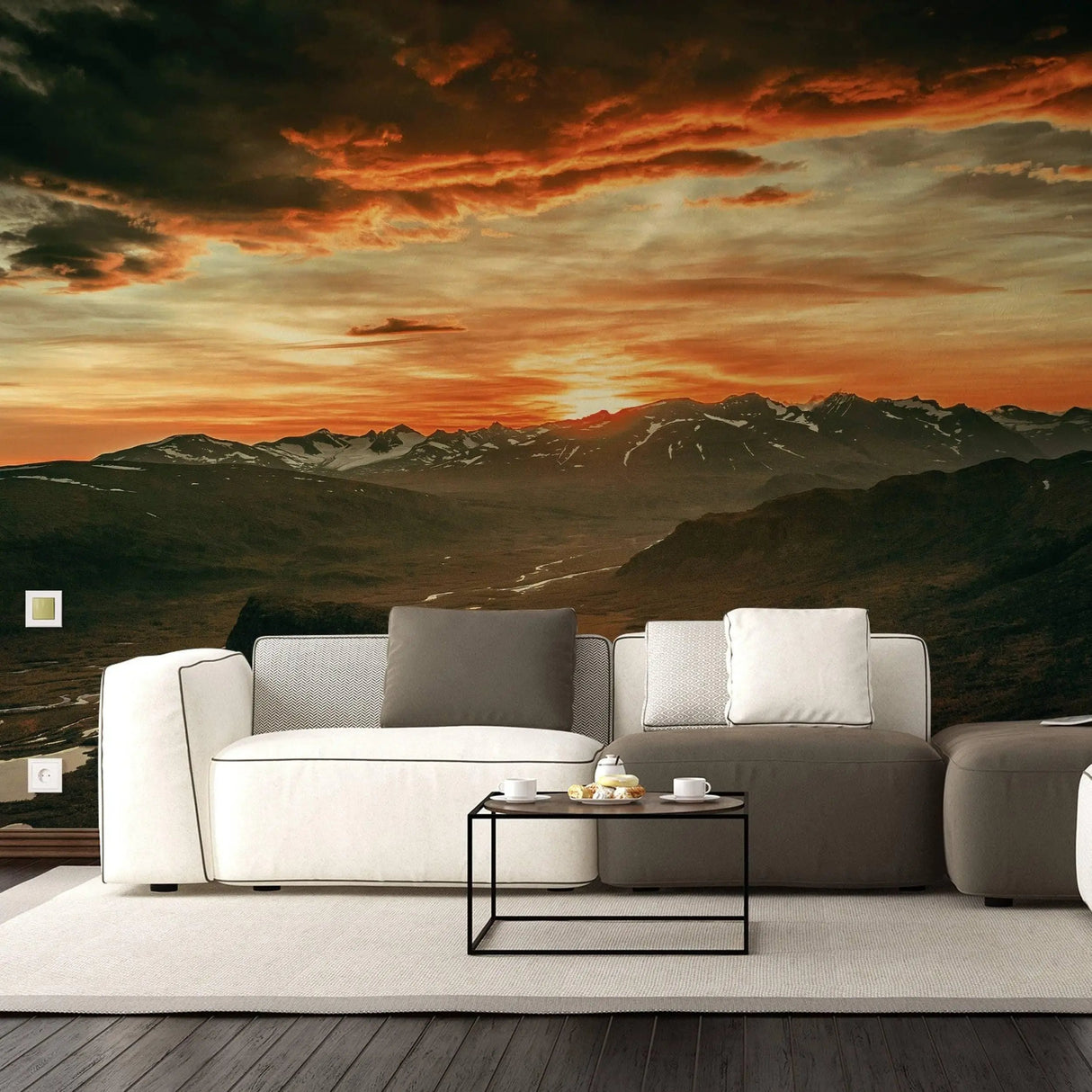 Majestic sunset wall stickers in modern living room decor, featuring mountain landscape and warm hues.