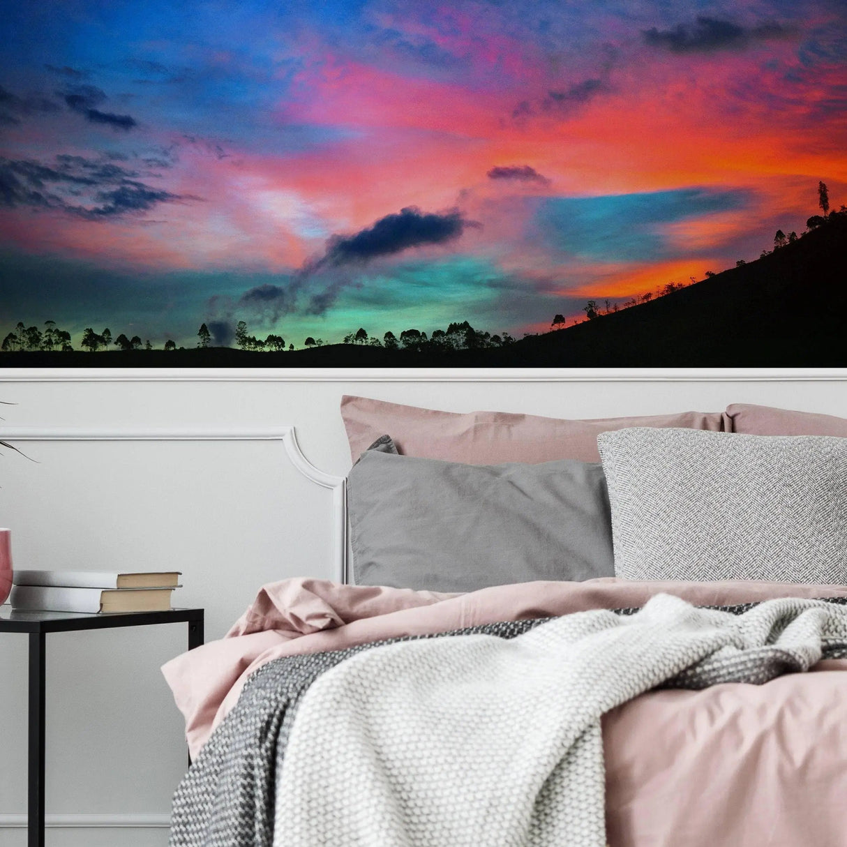 Sunset nature vinyl wall art decal above a cozy bed, creating a calming home decor atmosphere.