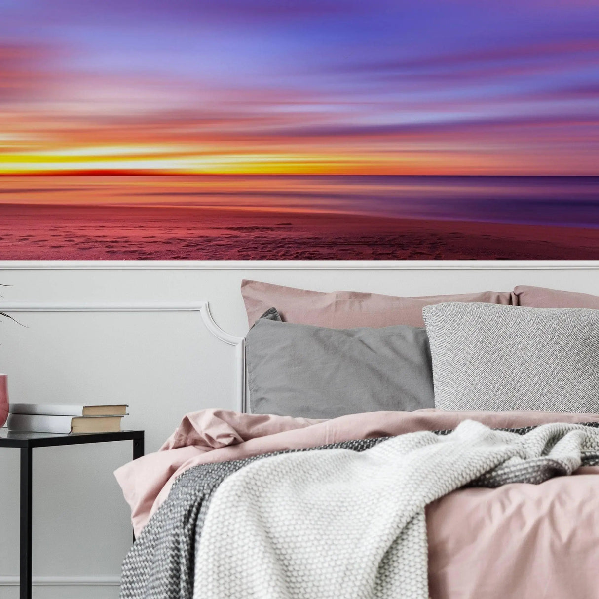 Stunning sunset wall decals creating a serene atmosphere in a cozy bedroom with soft bedding.