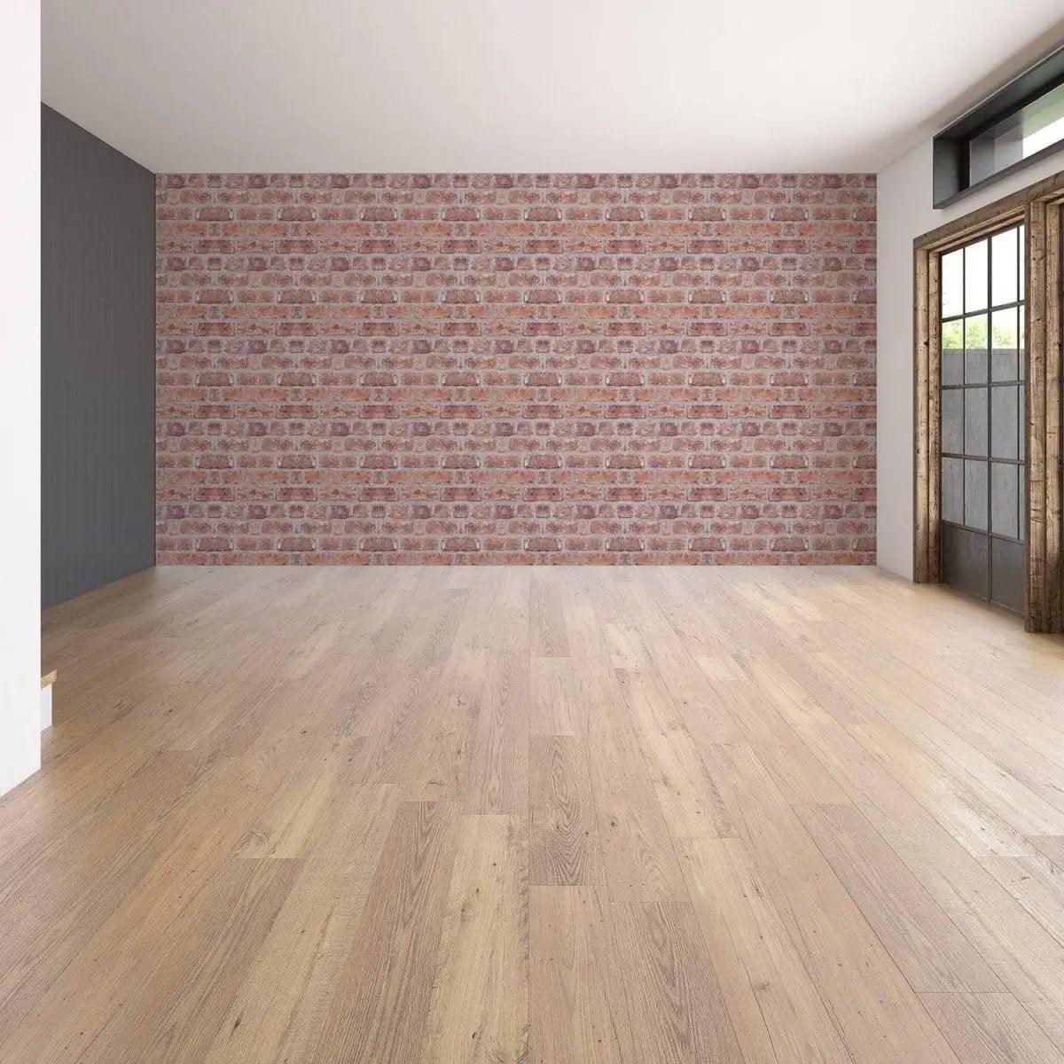 Interior view featuring brick self-adhesive wallpaper transforming a spacious room with wooden floors.