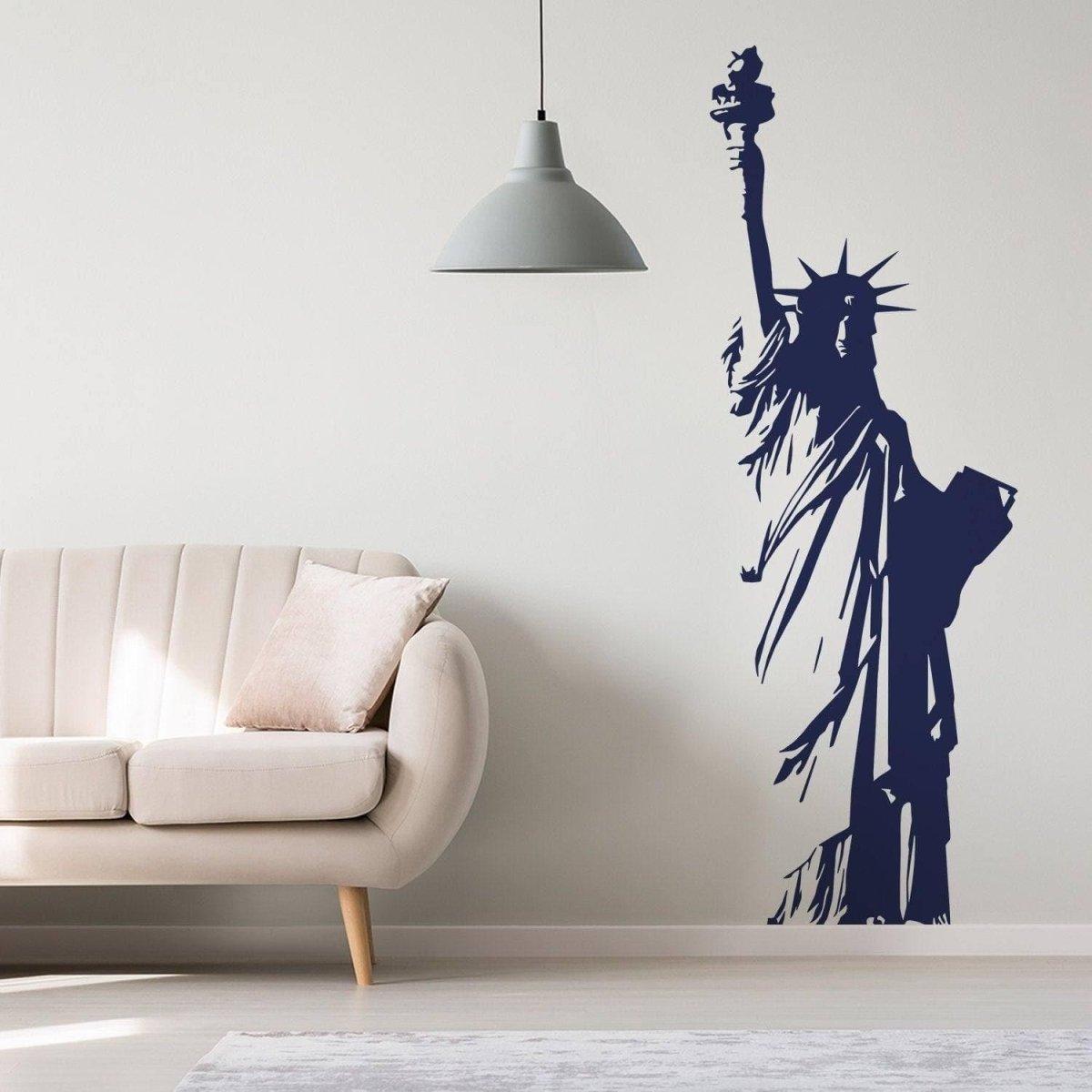 Statue of Liberty decal on wall beside modern beige sofa, showcasing patriotic American decor.