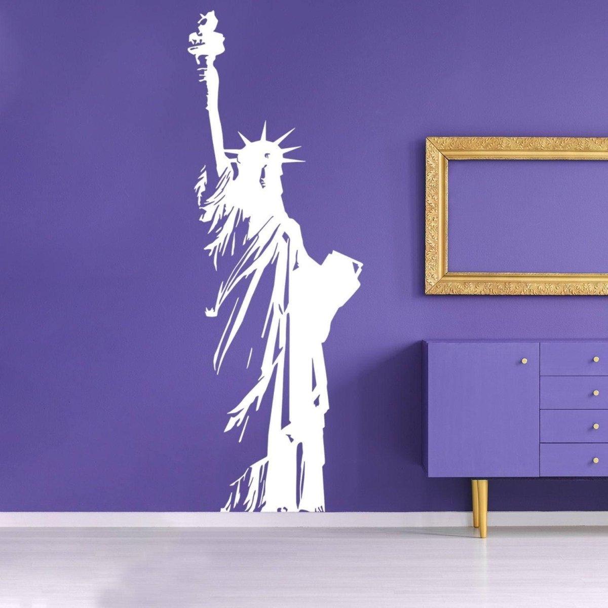 White Statue of Liberty decal on purple wall, showcasing American patriotism with decorative style.