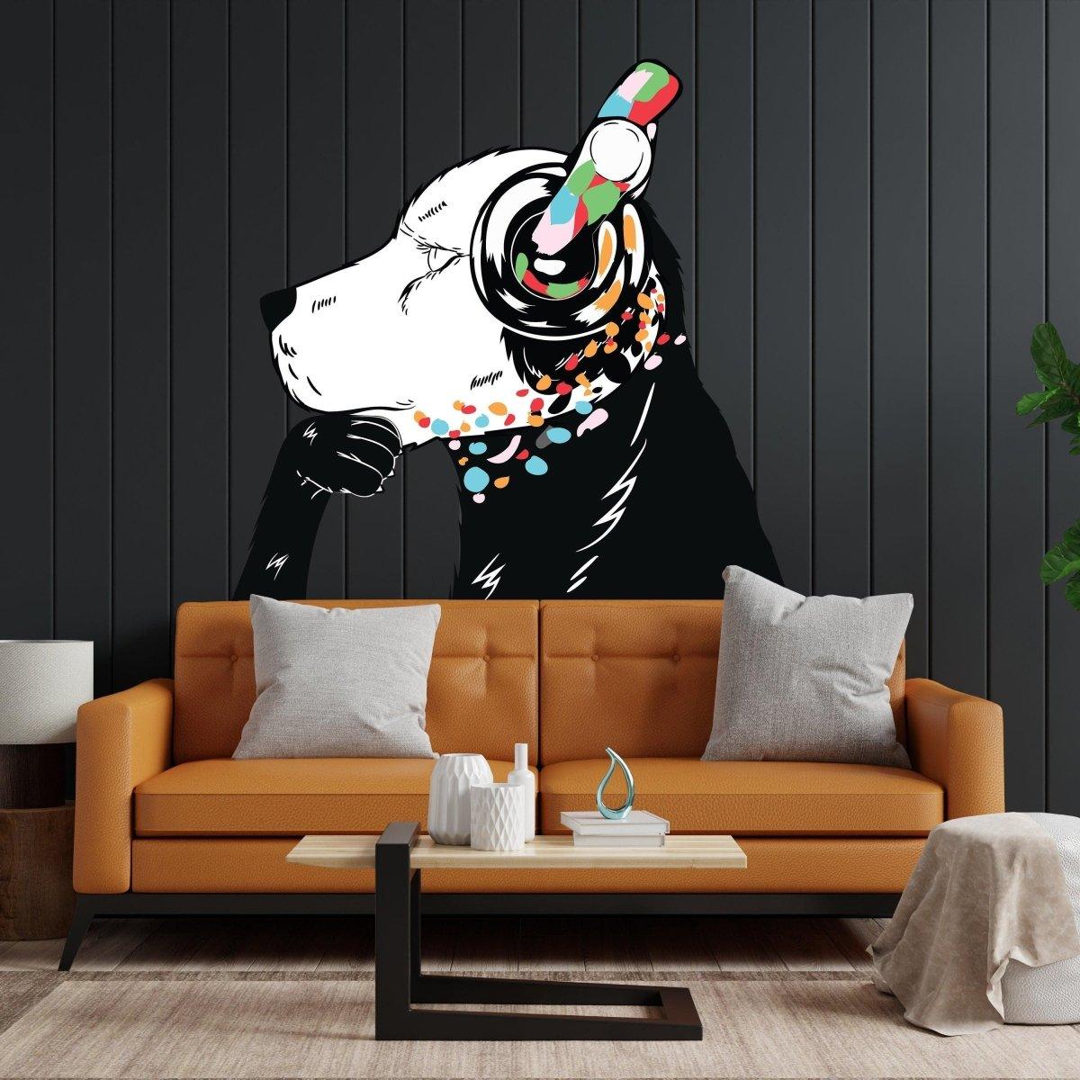Banksy style dog wall sticker with headphones, vibrant colors, on black wall above modern sofa.