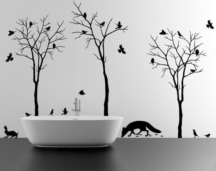 Botanical Wildlife Vinyl Decal Set featuring black trees, birds, and a fox for nature-inspired bathroom decor.
