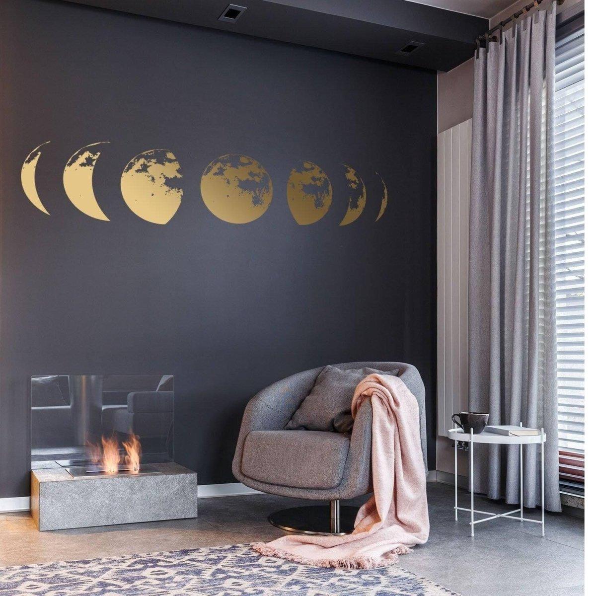Moon phase wall sticker in a stylish living room, showcasing celestial decor on a dark wall.