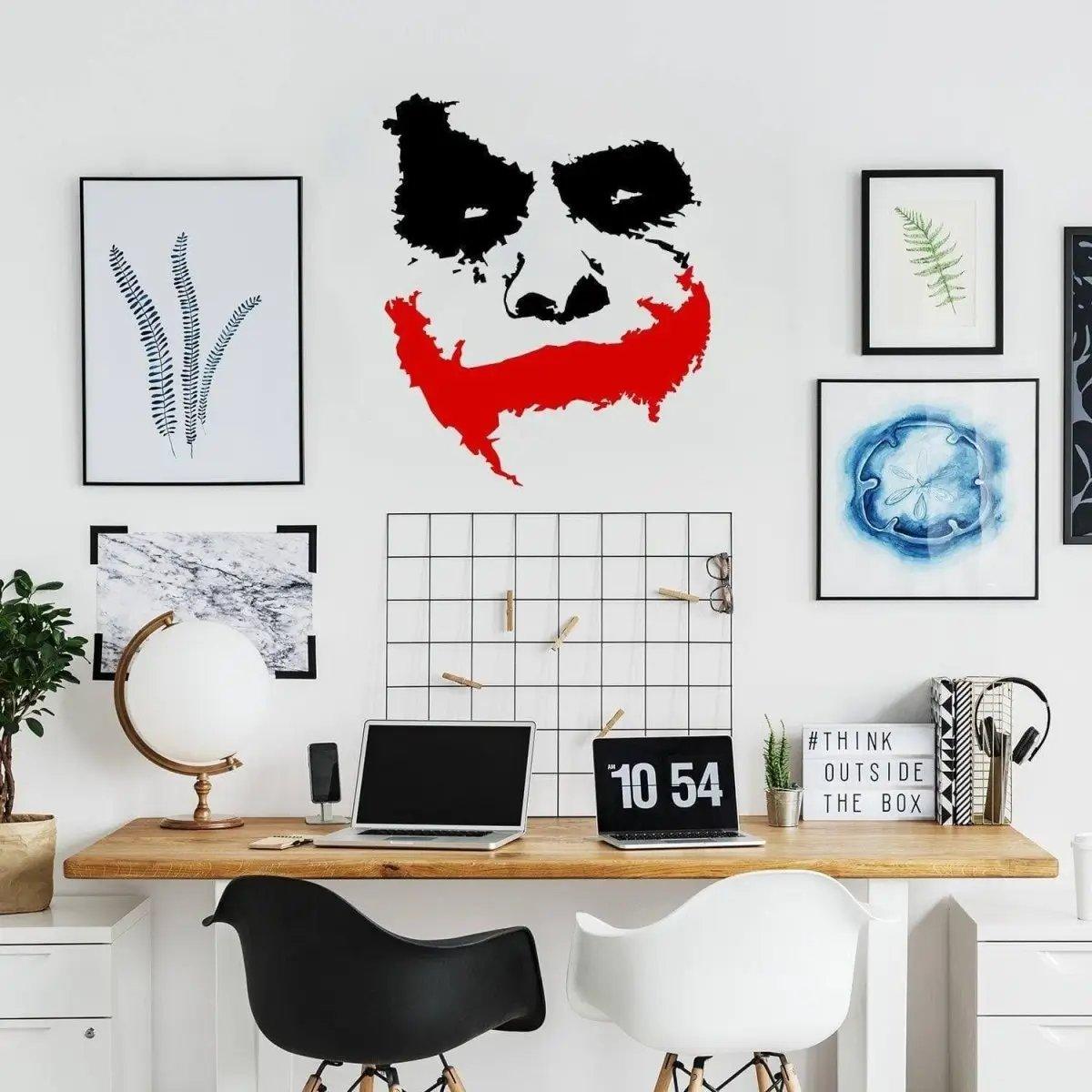 Joker Grin Decal on a modern wall in an office setting, featuring a creepy clown design with a red smile.