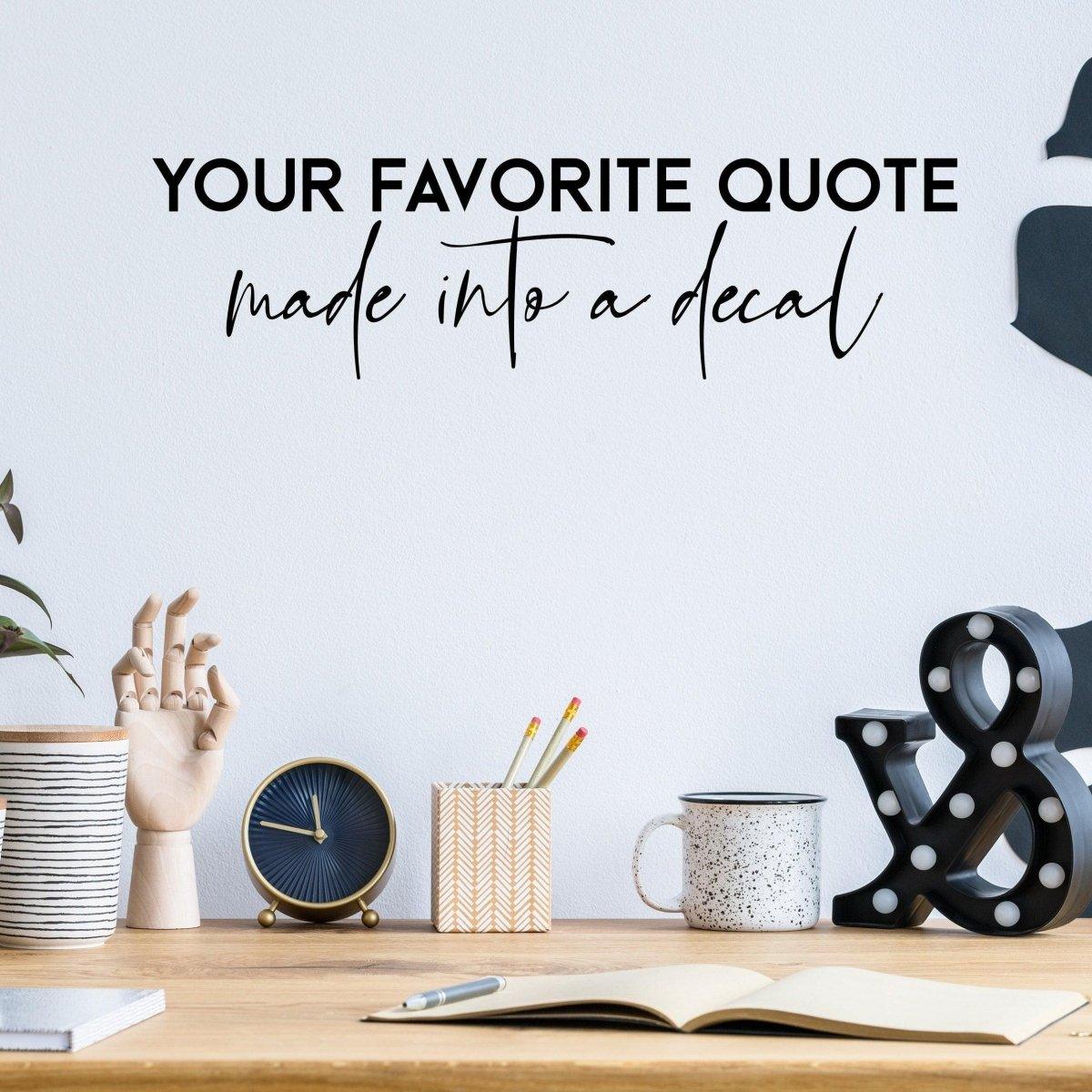 Personalized motivational wall sticker decor with the quote 'Your Favorite Quote' displayed in a stylish room.