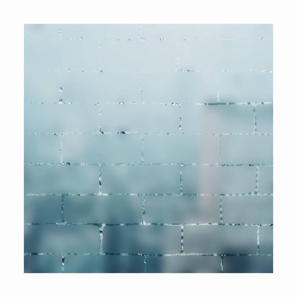 Frosted window film decal showcasing an elegant, blurred glass effect for enhanced privacy and natural light.