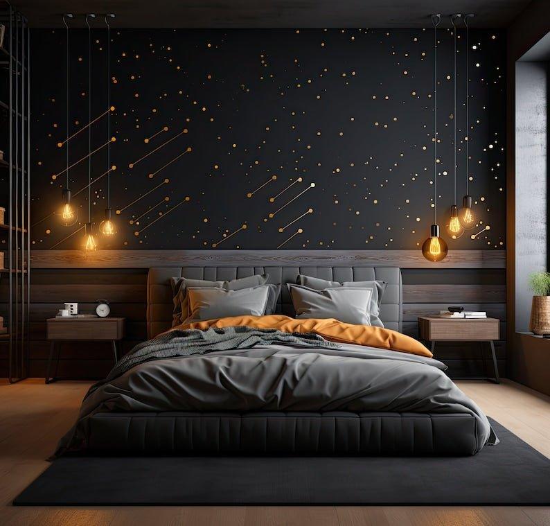 Stylish bedroom featuring gold geometric wall decals, grey bedding, and modern lighting in a chic atmosphere.