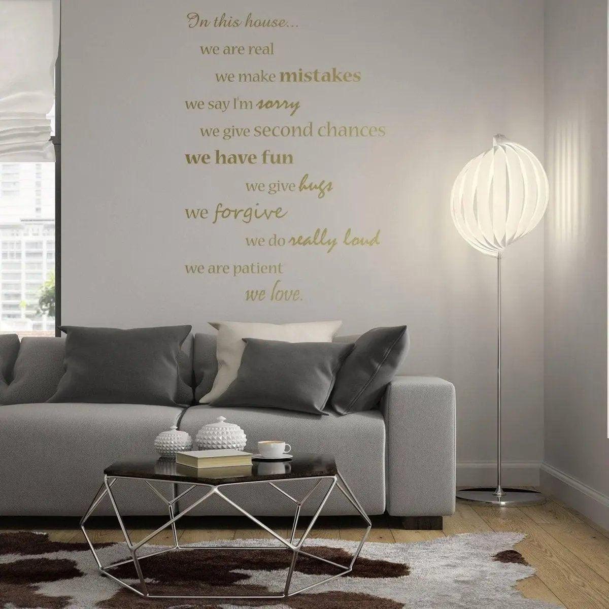 Elegant home wall decal with inspirational quotes in a stylish living room setting.