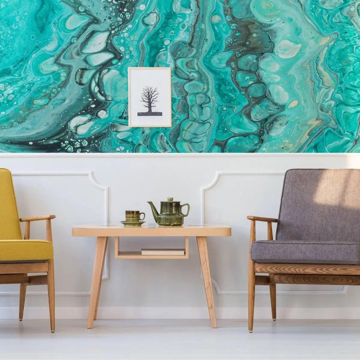 Contemporary living room with turquoise marble wallpaper and stylish furniture, featuring a wooden table and decorative teapot.