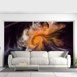 Vibrant abstract mural behind a modern white sofa, featuring swirling shades of orange and black for stylish decor.