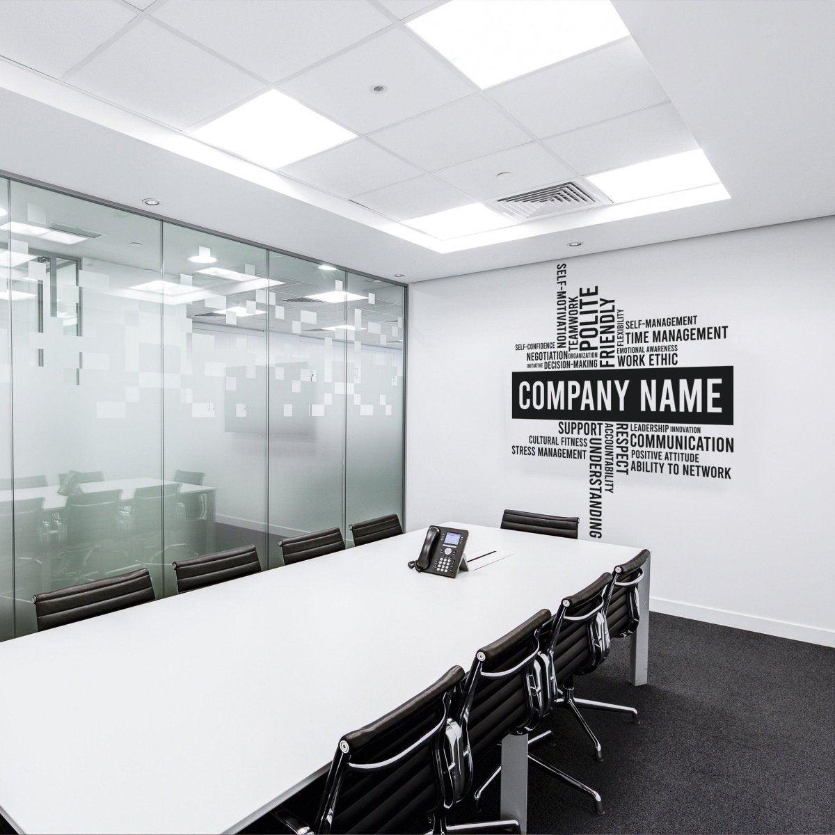 Modern office conference room featuring sleek design and motivational wall decal for a professional atmosphere.