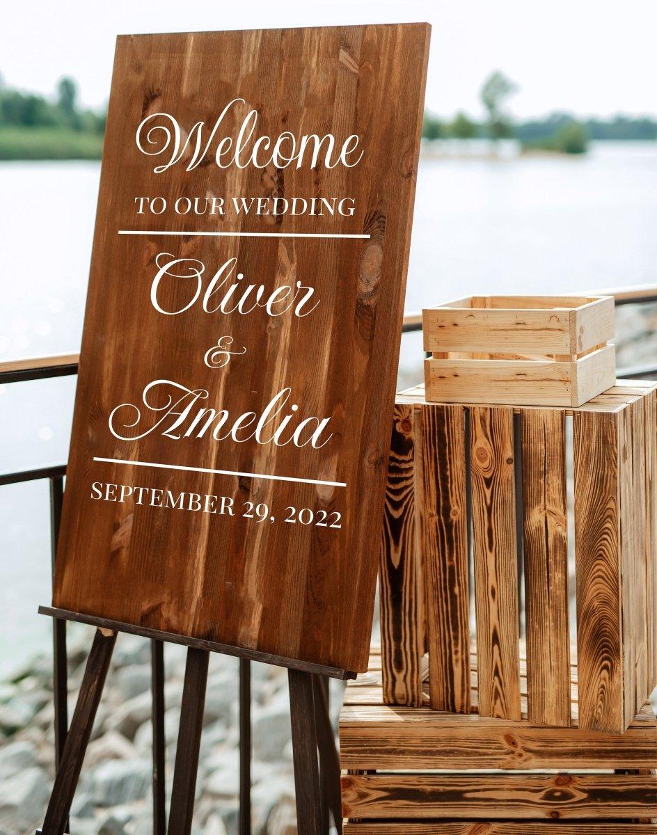 Personalized wooden wedding welcome sign for Oliver and Amelia, featuring elegant typography and wedding date.