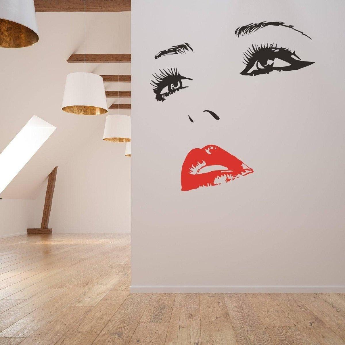 Elegant woman face wall decal with striking red lips, enhancing modern interior design.