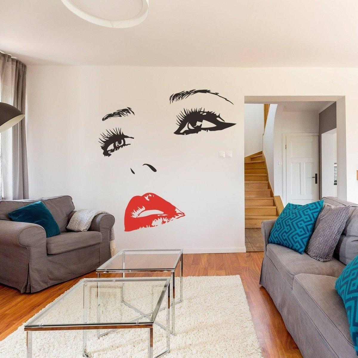 Elegant wall art decal featuring a woman's face with bold red lips, enhancing modern interior decor.