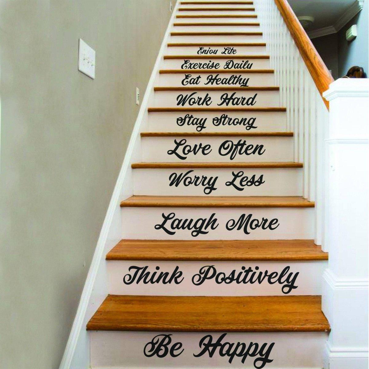 Staircase decorated with motivational vinyl quotes for a stylish home transformation.