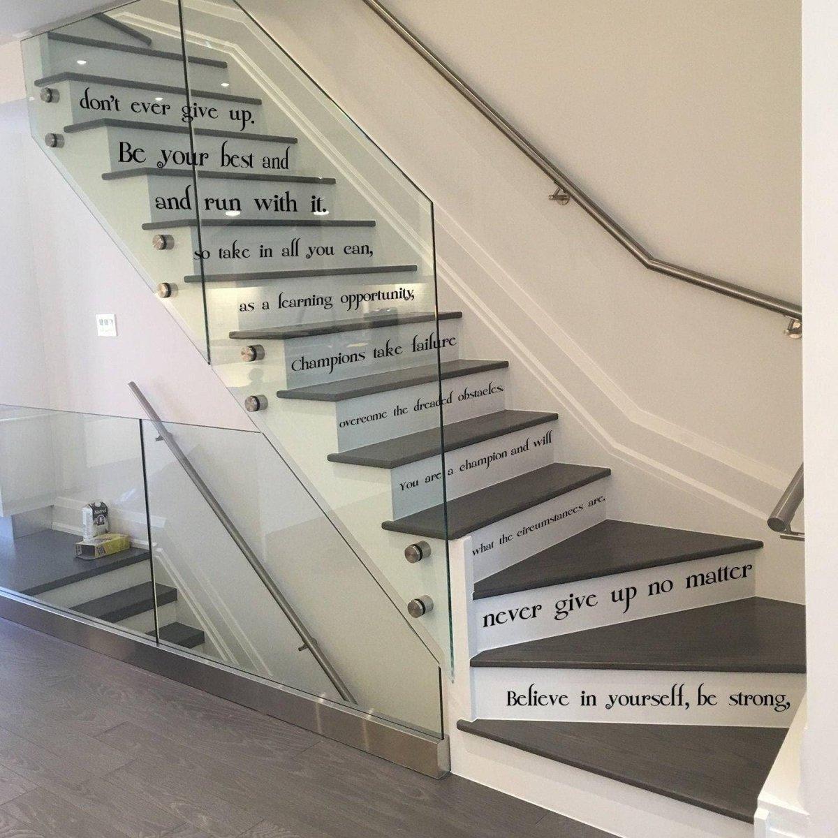 Inspirational vinyl decal on staircase with motivational quotes like 'Believe in yourself' and 'never give up no matter what'.