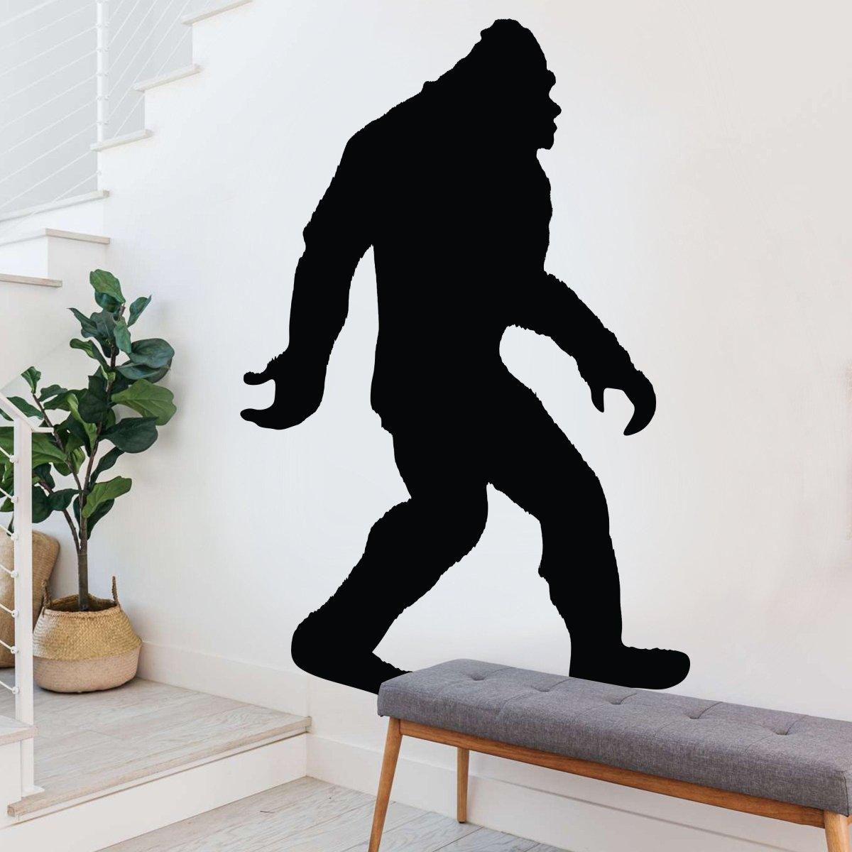BigFoot silhouette vinyl decal sticker on a wall, perfect for adding charm to collectibles and accessories.