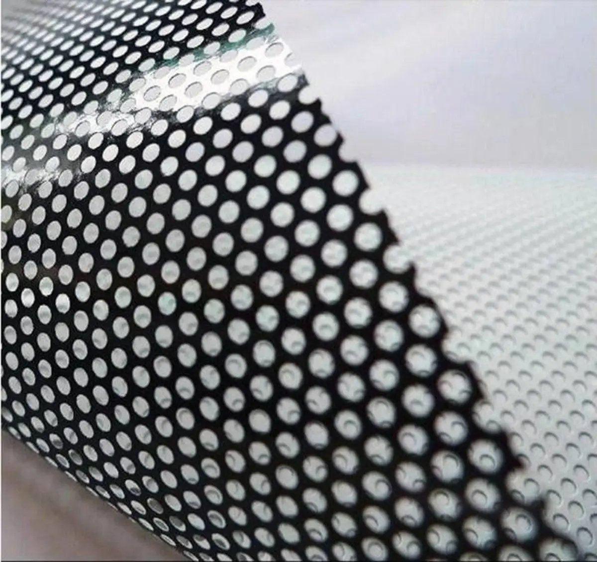 Close-up of advanced one-way vision perforated film showcasing 1.6mm perforations for optimal privacy and visibility.