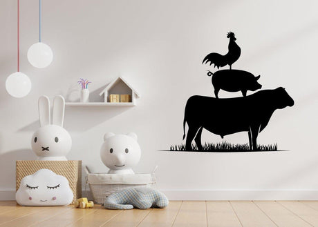 Charming wall art decal featuring a cow, pig, and rooster in a playful stacked arrangement for a farm-themed room.