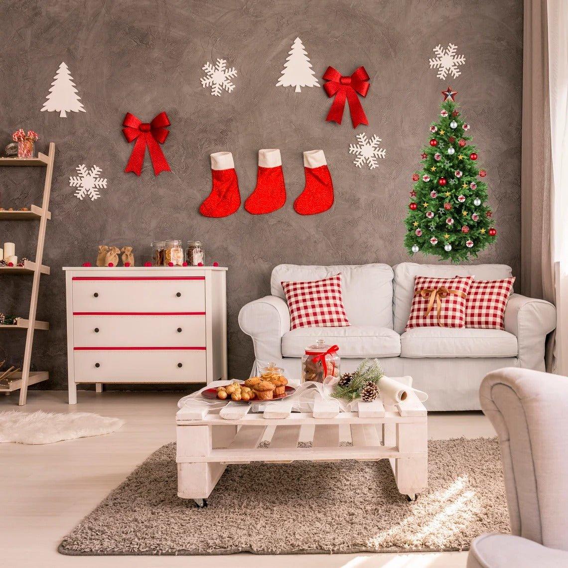 Festive living room decorated with Christmas wall decals, featuring a green tree, stockings, and red bows for holiday cheer.
