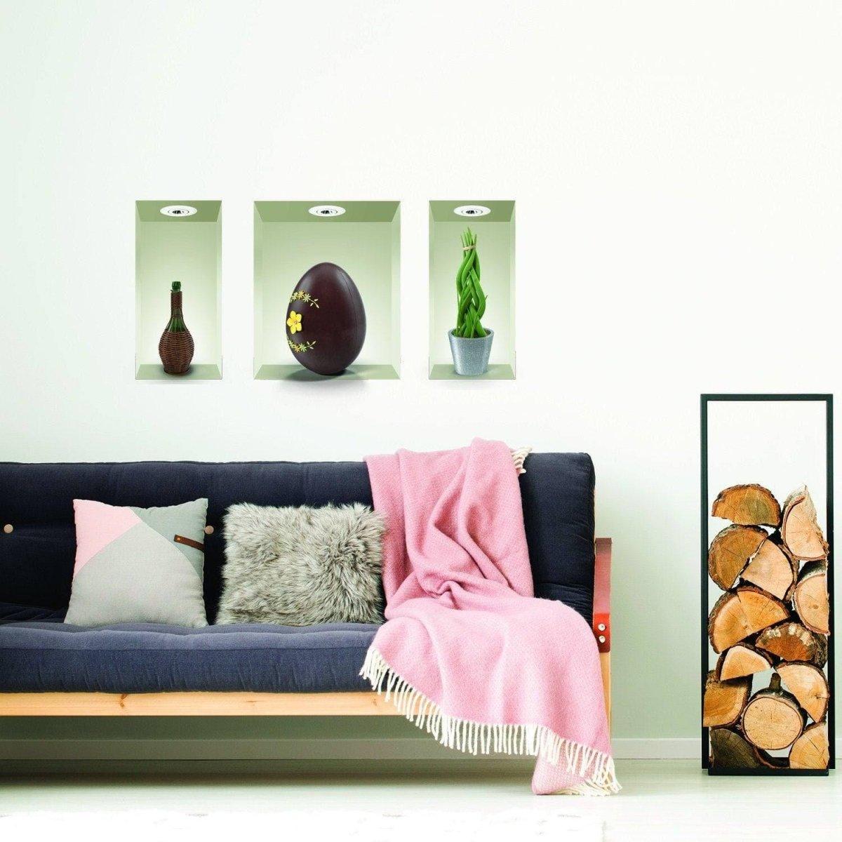 Modern living room with 3D wall decor including vases, an egg, and a plant beside a cozy couch and a pile of logs.