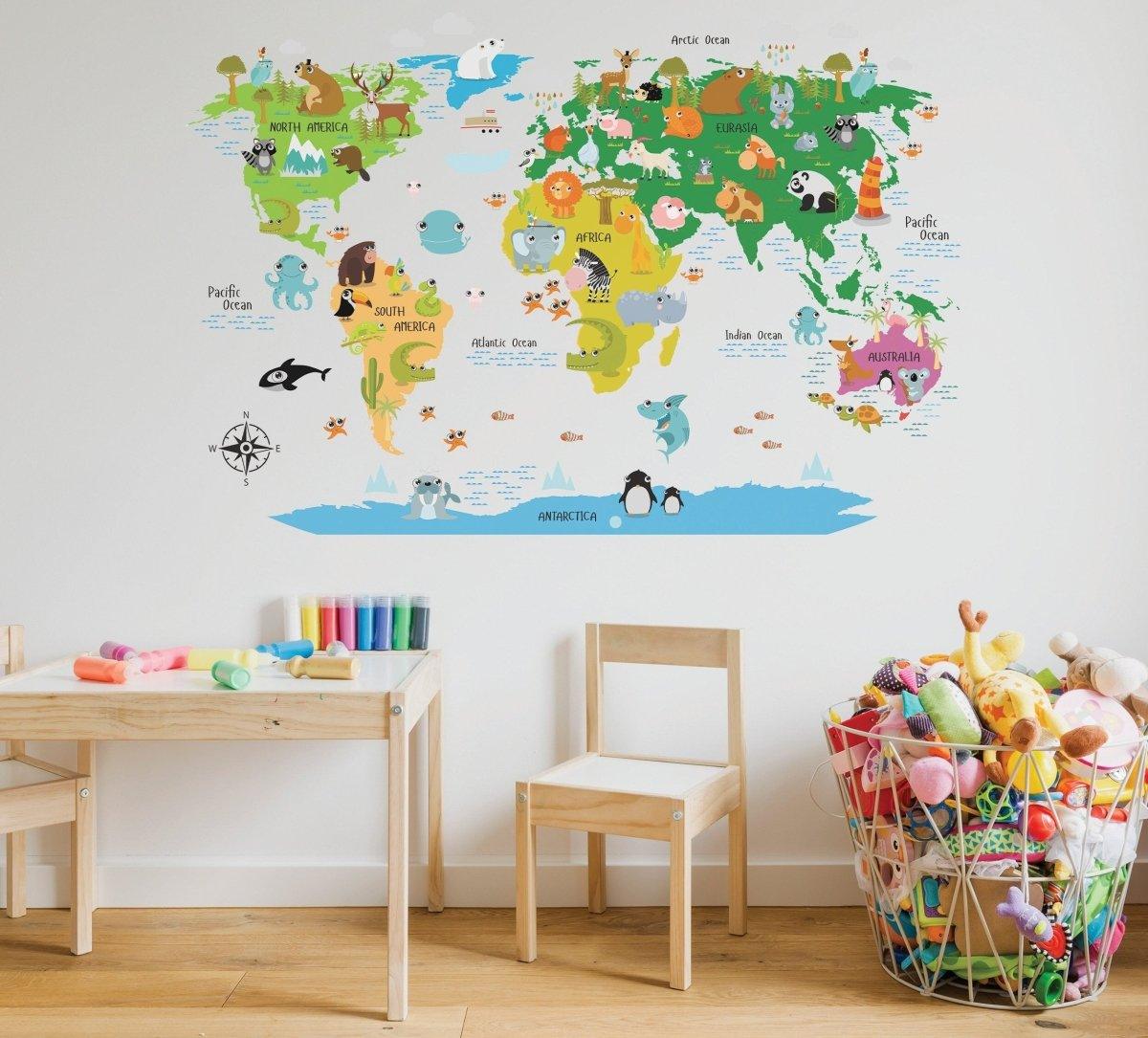 Colorful world map vinyl sticker on a nursery wall, featuring animals and ocean themes, perfect for kids' decor.