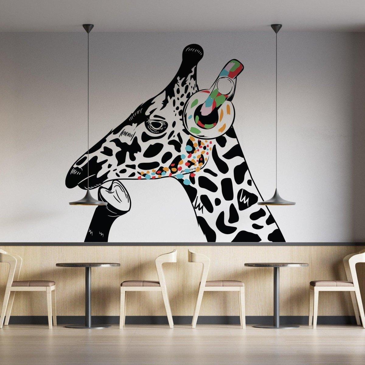 Dj Giraffe vinyl decal wall art, colorful giraffe with headphones in modern cafe setting.