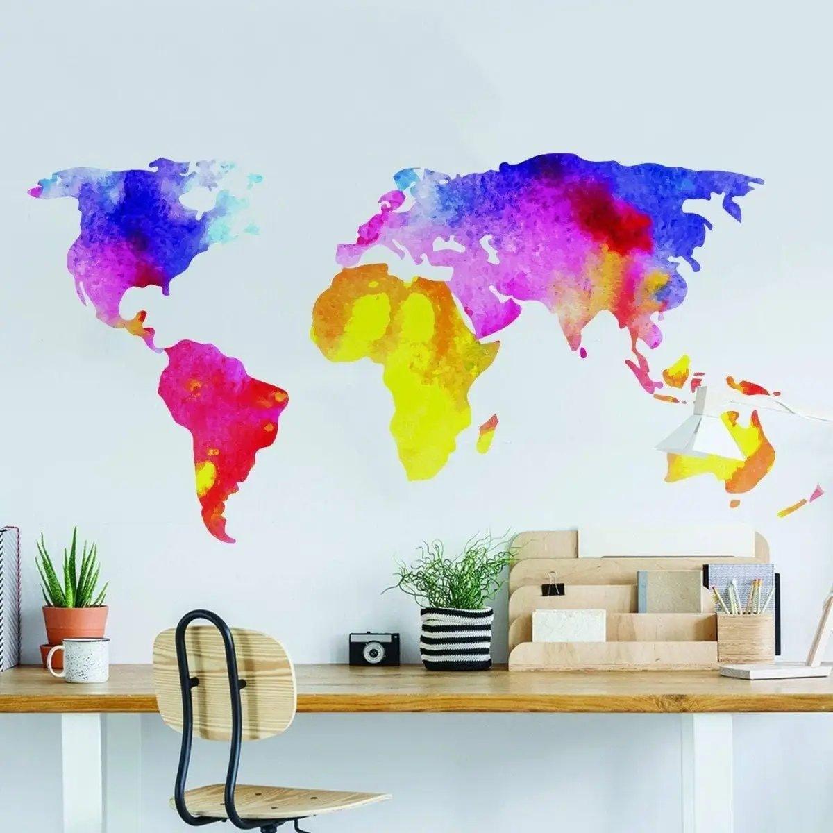 Colorful world map wall decal in a modern home office, enhancing decor with vibrant design.