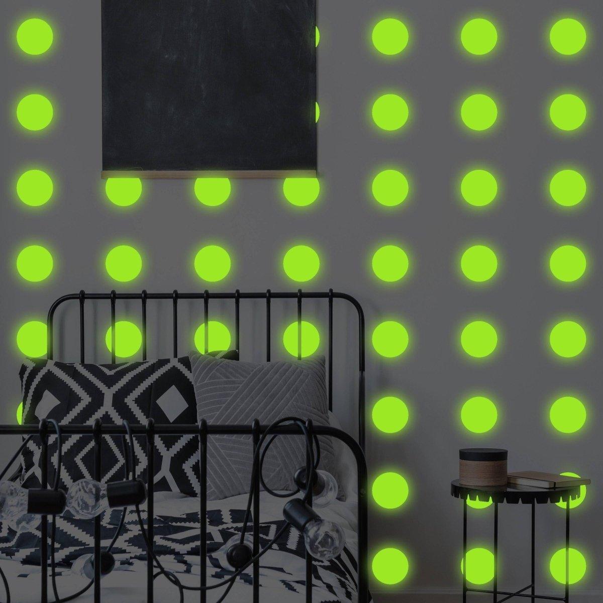 Illuminated glow in dark dot wall stickers in stylish bedroom decor, enhancing galaxy theme and creating a magical atmosphere.